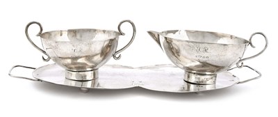 Silver set consisting of a tray, milk jug, and sugar bowl