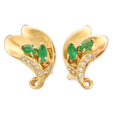 Pair of 18k gold earrings with diamond and marquise cut emerald.