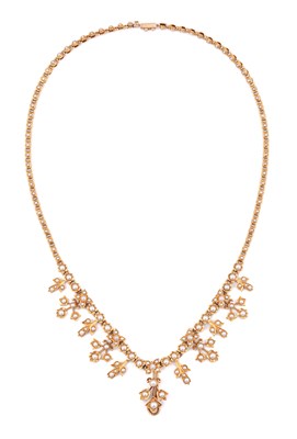 Necklace set with numerous natural pearls, mounted in 14k gold