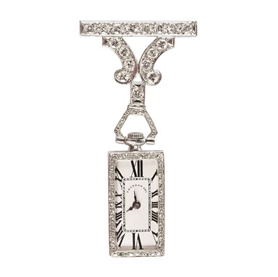 One stamped, platinum and old mine cut diamond watch pin