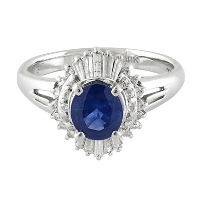Platinum Oval Blue Sapphire and Baguette Diamond Ring
