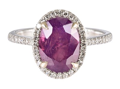 A Kashmir ruby ring set with diamonds.