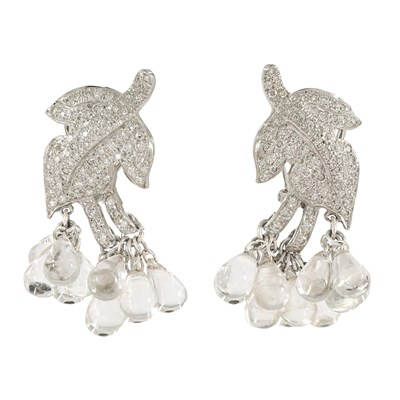 One pair of 18k white gold, round brilliant diamond androck crystal tassel earrings.