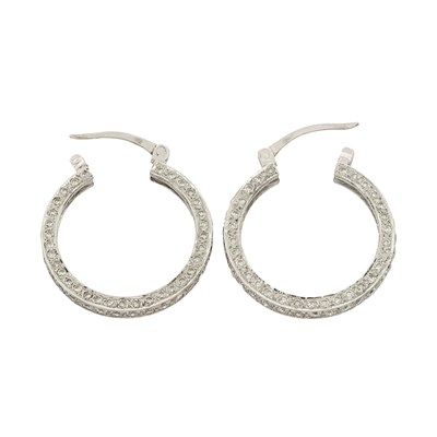 One pair of 18k white gold, round brilliant diamond androck crystal tassel earrings.