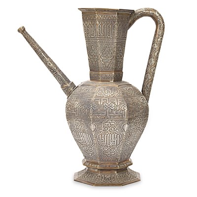 Early 20th century large Mamluk revival brass inlaid with silver ewer