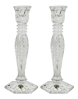 A pair of crystal glass candle holders by Waterford.